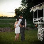 holding each other standing by a wagon